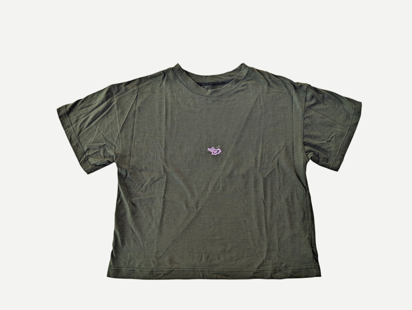 Green t-shirt with a small logo on a white background