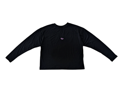 Black long-sleeve shirt with a small logo on a white background