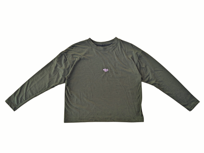 Green long-sleeve shirt with a small logo on a white background