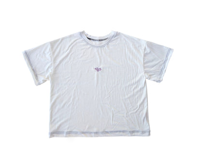 White t-shirt with a small logo and contrast black stitch on a white background