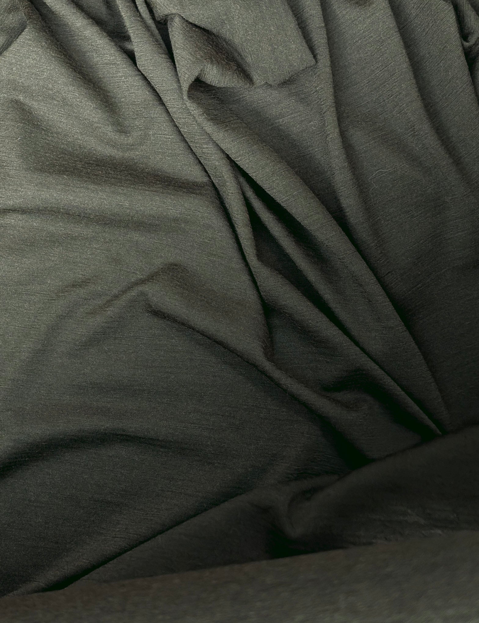 olive merino fabric scrunched slightly