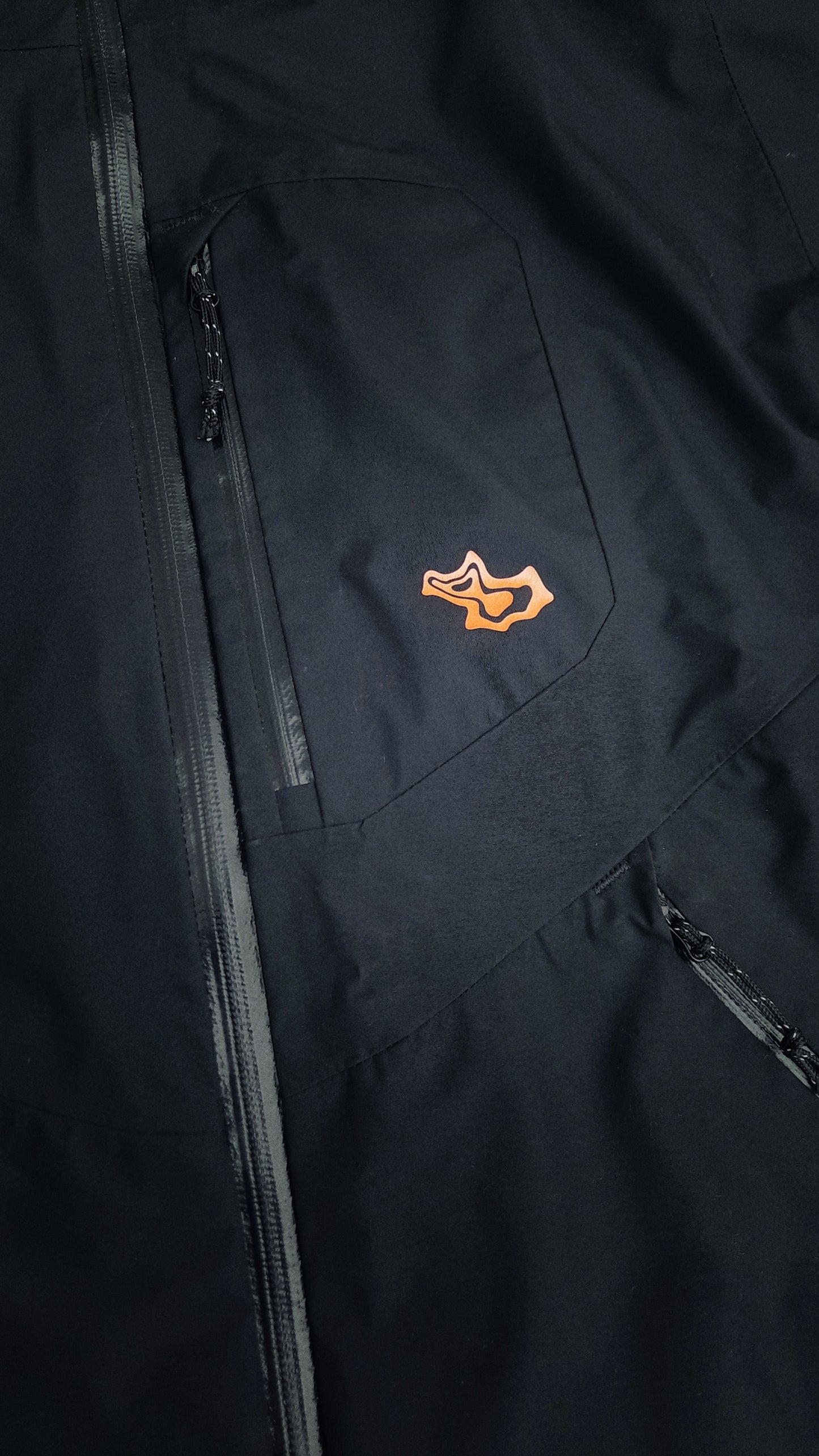 front ski shell jacket pocket with logo